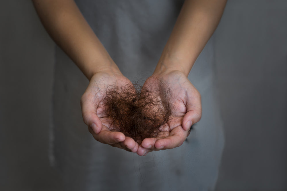 Understanding Hair Loss and Thinning: Causes, Natural Remedies, and Prevention Strategies